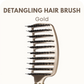 A MAGIC DETANGLING HAIR BRUSH